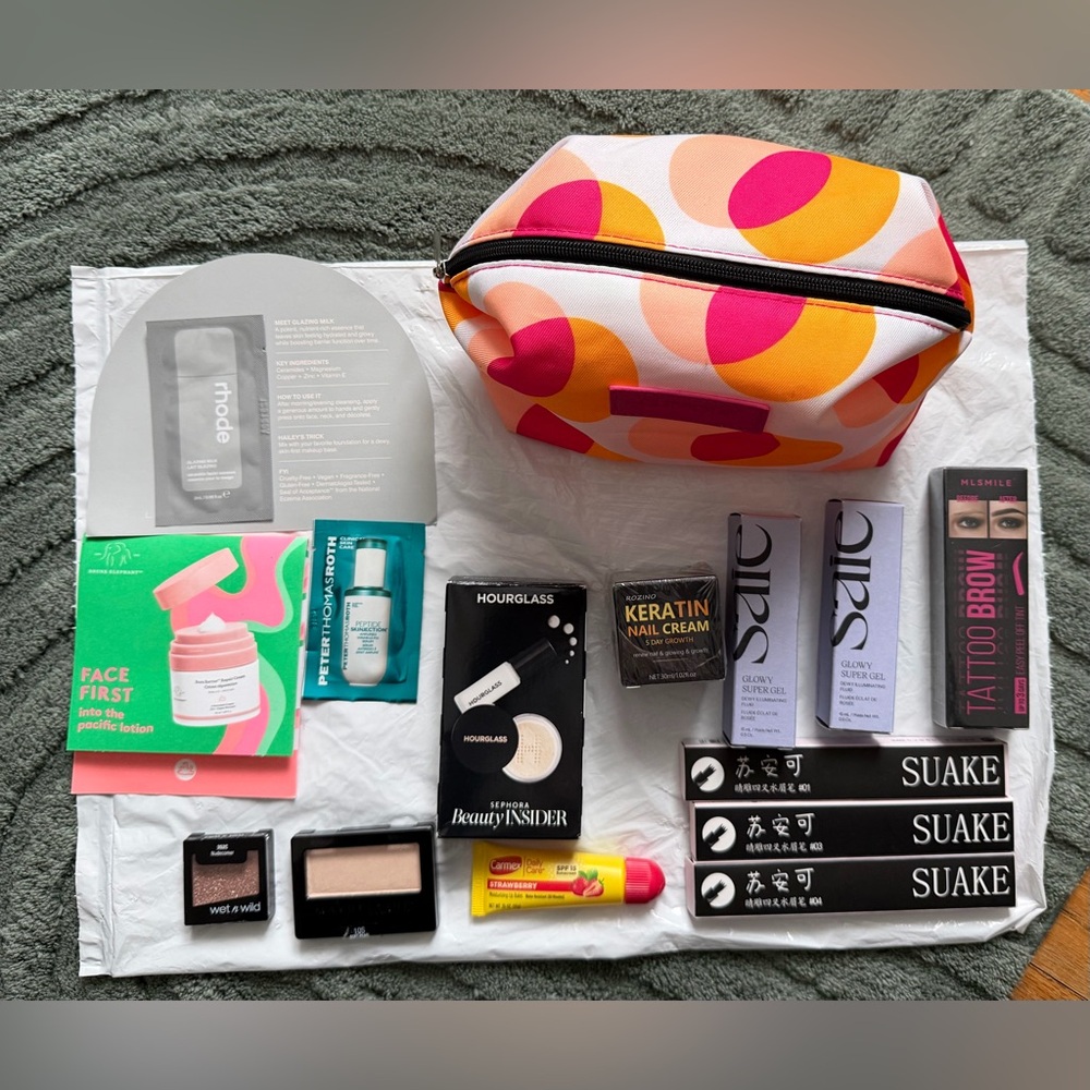 Clinique Polka Dot Cosmetic Pouch with Assorted Beauty Products